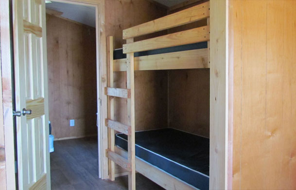 deluxe lakefront cabin rental interior bunks